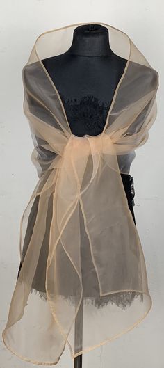 A very elegant organza shawl for your wedding party or evening dress. Made of light organza, slightly sparkles on the sun or light. Color: champagne / rose gold ( other colors are available ) Size : 200 cm x 45 cm You can use it as a wrap, shawl or stola. WE have matching bags in our Etsy Shop! WE accept credit cards! Elegant Spring Organza Tulle Fabric, Elegant Spring Tulle Fabric In Organza, Elegant Beige Tulle Fabric For Party, Elegant Tulle Fabric For Prom, Elegant Cream Sheer Tulle Fabric, Elegant Cream Party Veil, Sheer Organza Veil For Party, Sheer Organza Party Veil, Elegant Sheer Veil For Evening