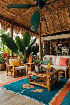 a living room with couches, tables and plants on the floor in front of a thatched roof