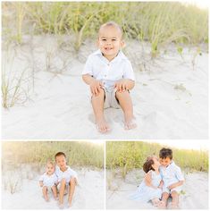 two young children are sitting on the sand and one is holding his mother's hand