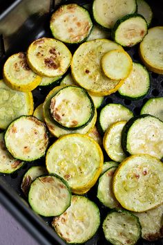 cooked zucchini and squash in a pan ready to be cooked on the stove