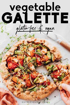 a pizza with vegetables on it and the words vegetable galette written in black