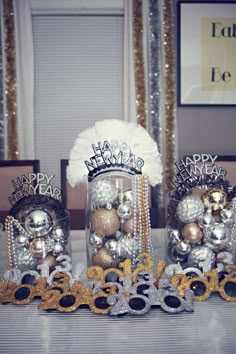 some silver and gold decorations on a table