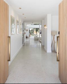 the hallway is clean and ready for us to use as an entrance way in this house