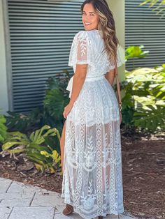 Bohemian V-neck, split embroidered lace dress, resort white maxi dress V-neck Lace Patchwork Dresses For Vacation, V-neck Dress With Lace Trim For Vacation, Delicate Lace V-neck Dress For Brunch, Floor-length Dress For Brunch During Beach Season, White Flowy V-neck Maxi Dress, White V-neck Midi Dress For Vacation, V-neck Vacation Dress With Lace Trim, Floor-length Maxi Dress For Brunch During Beach Season, V-neck Lace Trim Dress For Vacation