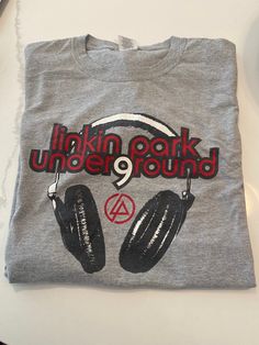 Gray Linkin Park Underground T-shirt with headphones graphic - from their fan club. Casual Logo Print T-shirt For Music Festivals, Casual T-shirt With Logo For Music Festivals, Casual Tops With Logo Print For Music Festivals, Casual T-shirt For Music Festival Fan Merchandise, Brown Hair Bangs, Wardrobe Pieces, Baggy Clothes, Hair Bangs, Streetwear Men