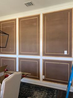 a room that has been painted brown and white