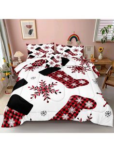 a bed with snowflakes on it in a room