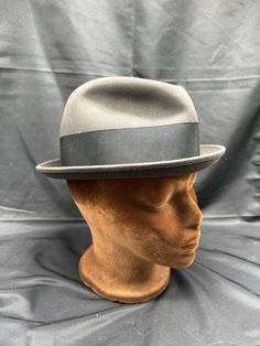 Vintage Grey Wool Dobb's Fifth Ave Fedora Hat size 7 Elevate your style with this vintage grey wool Dobbs Fifth Ave fedora hat in size 7. Crafted from 100% wool and featuring a classic fedora style, this hat is perfect for adding a sophisticated touch to any outfit. The grey color complements any skin tone, while the Dobbs brand ensures quality and timeless style. Ideal for vintage lovers and collectors, this hat belongs in your collection. The hat is in great condition and is ready to be worn for any occasion. Make a statement and add this grey wool Dobbs Fifth Ave fedora hat to your wardrobe today. Classic Gray Fedora With Curved Brim, Vintage Gray Brimmed Hat, Fitted Wool Hat Bands For Winter, Wool Hat Bands For Winter, Winter Wool Hat Bands, Fitted Fur Felt Hat With Flat Bill, Classic Gray Fedora Hat, Classic Gray Brimmed Hat, Formal Fur Felt Hat With Flat Bill