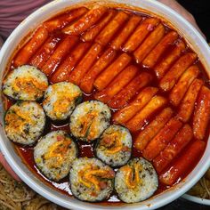 a platter filled with carrots and other food items