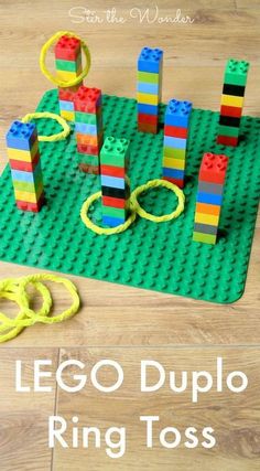 lego duplo ring toss game on the floor next to scissors and rubber bands