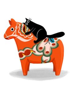 a black cat riding on the back of an orange horse with colorful patterns and designs