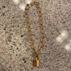 Authentic Louis Vuitton Lock (With Keys And Pouch) Made Into Necklace. I Have Never Used This Lock So It Is Brand New Louis Vuitton Lock Necklace, Louis Vuitton Necklace, Repurposed Necklace, Louie Vuitton, Button Necklace, Reworked Vintage, Louis Vuitton Jewelry, Gold Link Chain, Lock Necklace