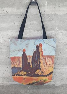 Monument Valley Navajo. This gorgeous all-over printed tote bag features sturdy, weather-resistant fabric and dual 100% natural cotton bull denim shoulder straps. Make a beautiful, artful statement with this stand out, all-season VIDA Tote Bag - whether on an afternoon stroll around town or a weekend out of town. Hand-cut and made in USA. Audacity Press original. Unique Tote Bag, Printed Tote Bags, Natural Cotton, Weather Resistant, Shoulder Straps, Made In Usa