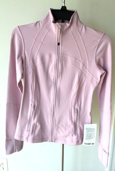 Materials Body: 87% Nylon, 13% Lycra® elastane Lining: 89% Nylon, 11% Elastane Lululemon Jacket With Sweatpants, Lulu Zip Up, Good Things For Christmas List, Pink Polo Jacket, Lululemon Sweater Outfit, Lulu Lemon Pink Jacket, Light Pink Lululemon Jacket, Lulu Lemon Define Jacket Pink, Pink Preppy Clothes