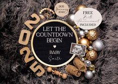 a black and gold baby announcement surrounded by silver and gold christmas balls, ornaments, and other items