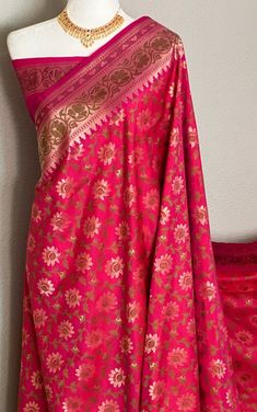 Beautiful Semi Katan Silk Banarasi Saree in Rani  pink Color. Ethnic Traditional Semi Katan Banarasi Saree with all over flower Zari butta with thread weaving gold. all over call work saree. Blouse piece attached. Ready to wear saree Fall , Pico and Tassels done perfect for wedding and parties. Length: 6 m (Unstitched Blouse piece included). Wash care: Dry clean only. The product color may slightly vary due to photographic lighting sources or your computer settings.  please contact us if you have any questions regarding the product. Transitional Pink Saree With Zari Work, Traditional Pink Blouse Piece With Zari Work, Bollywood Style Pink Saree For Transitional Season, Pink Bollywood Saree For Transitional Season, Pink Blouse Piece For Transitional Season In Traditional Drape, Transitional Pink Blouse Piece With Traditional Drape, Fitted Pink Traditional Wear With Zari Weaving, Pink Traditional Wear For Festive Ceremonies, Pink Paithani Silk Traditional Wear With Patterns