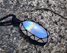 Beautiful handmade Macrame iridescent Rainbow Moonstone crystal pendant, with an adjustable black necklace cord. Rainbow Moonstone has a highly spiritual nature that will assist women to recognize and embrace their innate personal power. It encourages fervent desires, eager expectation, and heartfelt resolve. It helps to balance the masculine-feminine vibrations within your body and will nurture your spirit. This necklace is a unique creation that will shine out the uniqueness within you! It can Adjustable Mystical Moonstone Crystal Necklace, Mystical Adjustable Moonstone Crystal Necklaces, Adjustable Spiritual Moonstone Crystal Necklace, Adjustable Moonstone Crystal Necklaces For Meditation, Rainbow Moonstone Crystal, Spiritual Nature, Dog Spa, Masculine Feminine, Crystal Goddess