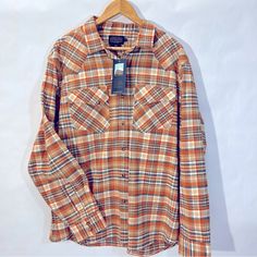 Wyatt Snap Front Shirt In Orange, Navy & Tan Plaid. 100% Cotton Xl 25 1/2” Pit To Pit 25 1/2” Sleeve 29” In Length Tags: Plaid Wyatt Snap Shirt Western Shirt Hibiscus Shirt, Pendleton Shirts, Tan Plaid, Button Up Shirt Mens, Wool Flannel, Wool Shirt, Long Sleeve Plaid Shirt, Long Sleeve Flannel, Striped Hoodie