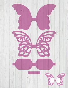 a pink butterfly cutout on a white wood background