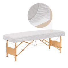 an image of a massage table with a cover on it's back and side