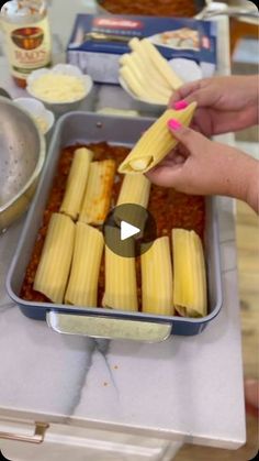 430K views · 22K reactions | 🧀 Easy Stuffed Manicotti with String Cheese!

Ingredients:
- 8 oz manicotti pasta
- 1 lb ground Italian sausage
- 24 oz marinara sauce
- 10 string cheese sticks
- 1 cup shredded mozzarella
- 1 cup shredded parmesan
- 1/4 cup fresh basil, chopped

Directions:
1️⃣ Preheat oven to 350°F.
2️⃣ Cook & drain pasta.
3️⃣ Brown sausage, drain fat, and mix in marinara.
4️⃣ Pour half the sauce into a 9x13 dish.
5️⃣ Stuff manicotti with string cheese, place in dish, and cover with remaining sauce.
6️⃣ Sprinkle cheeses on top, cover with foil, and bake 25 mins. Uncover and bake 5-10 more mins. Top with basil & enjoy!

#EasyRecipes #PastaLovers #WeeknightMeals #FoodHacks @raoshomemade @barillaus | Hip2Save | Yello · Oh Yeah Stuff Manicotti Recipes, Manicotti Stuffed With Cheese Sticks, Cheese Stick Stuffed Manicotti, Manicotti With String Cheese, Easy Stuffed Manicotti, String Cheese Stuffed Manicotti, Small Lasagna Recipe, Easy String Cheese Manicotti Recipe, Dump And Bake Manicotti String Cheese