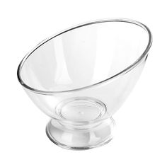 a clear glass bowl on a white background