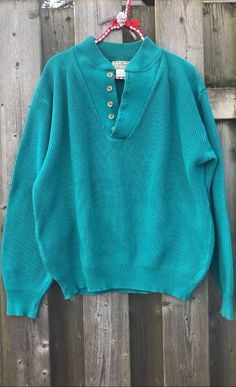 Vintage LLBean button up sweater in gorgeous teal green.  Made in USA.  Tag size men's large.  100% cotton  (Two small stains on arm as pictured) Measurements taken with garment laying flat (x2 for circumference) Shoulder to shoulder 22 1/4" Pit to pit 26" Waist 18 1/2" - 21 1/2" Length 25 1/4" Sleeve 24" Tracking included Green Cotton Polo Sweater For Fall, Green Cotton Sweater With Button Closure, Green Cotton Polo Sweater For Winter, Vintage Cotton Polo Sweater For Fall, Vintage Green Oversized Sweater, Freeport Maine, Button Up Sweater, Vintage Streetwear, Ll Bean