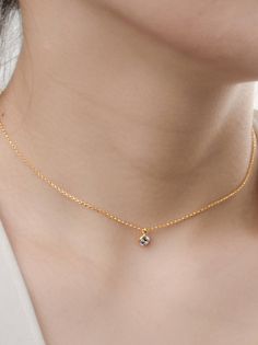 "LISTING Dainty Chain Necklace DETAILS * Charm: faceted round 0,16\" (4mm) white zirconia We offer 4 chain lengths: * Chain 1: 15.7\" (40cm) length Levels of adjustment 13.8\"- 15.7\" (35 - 40cm). * Chain 2: 17.7\" (45cm) length Levels of adjustment: 16.9\" (43cm) and 15.7\" (40cm). * Chain 3: 19.7\" (50cm) length Levels of adjustment: 18.5\" (47cm) and 17.3\" (44cm). * Chain 4: 21.7\" (55cm) length Levels of adjustment: 20.5\" (52cm) and19.3\" (49cm). * The model is wearing multiple necklaces. Dainty Birthstone Necklace With Clavicle Chain For Everyday, Minimalist Birthstone Necklace With Adjustable Chain For Anniversary, Simple Gold Solitaire Necklace With Delicate Chain, Simple Solitaire Necklace With Delicate Gold Chain, Minimalist Rose Gold Solitaire Necklace With Clavicle Chain, Minimalist Solitaire Necklace With Adjustable Chain, Minimalist Rose Gold Solitaire Necklace, Dainty Solitaire Necklace With Clavicle Chain And Round Pendant, Minimalist Birthstone Necklace With Round Pendant