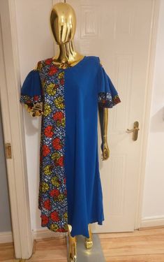 Material: Mixed Size: Fits UK size 8-14 Length: Mid Length  Beautiful mixed Ankara boubou dress, Maxi Dress, suitable for all seasons. Comfortable and fashionable free size. Please note colour may appear slightly different from physical product due to image capture settings. You can check our store for various beautiful items. https://www.etsy.com/uk/shop/YettyPrizesTextile If you have any questions be free to message me. Thanks for visiting our shop! Fitted Blue Ankara Maxi Dress, Traditional Batik Print Short Sleeve Maxi Dress, Traditional Batik Print Maxi Dress With Short Sleeves, Traditional Fitted Kaftan With Short Sleeves, Blue Bohemian Dress With Traditional Patterns, Traditional Fitted Blue Dress, Fitted Blue Patchwork Midi Dress, Fitted Blue Maxi Dress With Patchwork, Fitted Blue Midi Dress With Patchwork