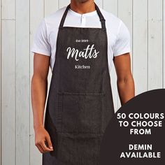 a man wearing an apron with the words matt's kitchen printed on it