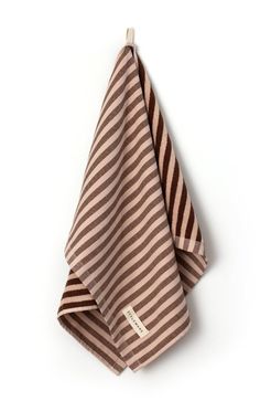 a brown and white striped towel hanging from a hook