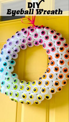 a diy eyeball wreath hanging on the front door