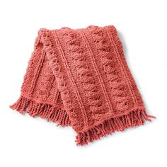 an orange knitted scarf on a white background