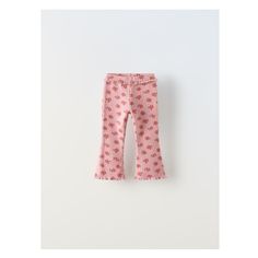 FLORAL FLARED LEGGINGS Stretch Cotton Bottoms With Ruffle Hem, Pink Stretch Bottoms With Ruffle Hem, Stretch Pink Bottoms With Ruffle Hem, Elastic Cotton Leggings For Spring, Cute Red Ruffled Bottoms, Elastic Cotton Bottoms With Ruffles, Elastic Cotton Ruffled Bottoms, Playful Pink Cotton Leggings, Playful Stretch Ruffle Bottoms