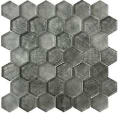 a gray hexagonal tile pattern on a white background with black and grey colors