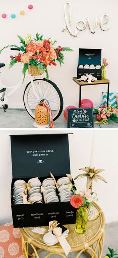 a table topped with plates and cups filled with desserts next to a sign that says love