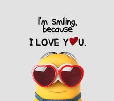 a yellow minion with heart shaped sunglasses and the words i'm smiling, because i love you