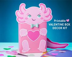 a pink valentine's box with an angel design