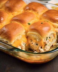 a casserole dish with chicken and cheese on top, ready to be eaten