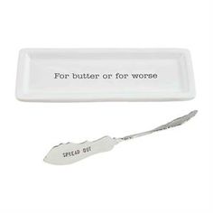 a spoon with the words for butter or for worse on it next to an empty tray