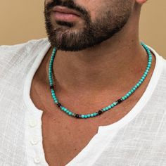 Looking for a gift for your man? You've found the perfect item for this!  This unique turquoise beaded necklace for men is the perfect accessory to add a touch of style to any outfit. Handcrafted with high-quality turquoise beads, this necklace is set with 5 striking black onyx beads for a bold and sophisticated look. Whether you're dressing up for a special occasion or looking to elevate your everyday style, this statement piece is sure to make a statement. Add this stunning necklace to your co Men Necklaces, Mens Beaded Necklaces, Estilo Boho Chic, Turquoise Bead Necklaces, Mens Jewelry Necklace, Stone Beaded Necklace, Onyx Necklace, Gift For Husband, Onyx Bead