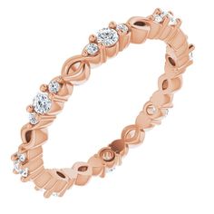 a rose gold wedding band with diamonds