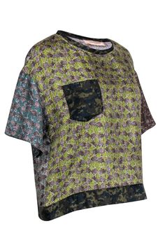 Love to mix and match? This La Prestic Ouiston silk blouse is just the thing! A fun boxy drop shoulder silk blouse with short sleeves and fun green-toned prints. The featured prints mix a repetitive ballerina pattern wearing a cheetah dress accented with camo hem, neckline, and front breast pocket. Style with black mom jeans, fun clogs and an easy crossbody bag for funky yet casual #OOTD. Size S (Le Prestic Ouiston 1) 100% Silk Pull-on Unlined Round neckline Short sleeves Camo hem, neckline, and Green Printed Crew Neck Blouse, Silk Graphic Print Short Sleeve Tops, Silk Short Sleeve Tops With Graphic Print, Silk Graphic Print Multicolor Tops, Silk Multicolor Graphic Print Tops, Multicolor Silk Tops With Graphic Print, Casual Silk Tops With Floral Print, Silk Summer Tops With Graphic Print, Silk Graphic Print Top For Summer