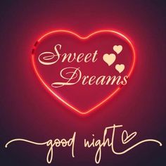 a neon heart with the words sweet dreams good night written in white lettering on it