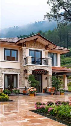 a large house with lots of windows and landscaping