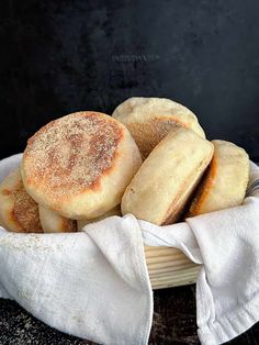 some sugary pastries are in a white bowl