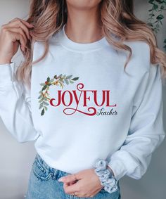 This sweatshirt is perfect for all Christmas lovers. Also as a gift for Christmas.  ♥ PRODUCTION TIME: 1-5 days (Usually 2-3 days) ♥ SHIPPING TIME: 2-5 days (Usually 3 days) ♥ PRODUCT DESCRIPTION: Gildan 18000 Made with a medium-heavy fabric blend of 50% cotton and 50% polyester (8.0 oz/yd² (271.25 g/m this sweatshirt feels cozy and is the perfect choice for those colder months. The classic fit along with the crew neckline deliver a comfy wearing experience with a clean-cut style. Meanwhile, the double-needle stitching at the shoulder, armhole, neck, waistband, and cuff seams add top-tier durability. Say goodbye to itchiness thanks to the gray, pearlized tear-away label. Made using 100% ethically grown US cotton. Gildan is also a proud member of the US Cotton Trust Protocol ensuring ethica Preschool Teacher Christmas Gifts, Teacher Christmas Gifts Preschool, Teacher Christmas Sweatshirt, Santas Favorite Ho, Teacher Sweatshirt, Gifts Teacher, Christmas Lovers, Teacher Christmas Gifts, Teacher Christmas