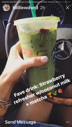 a person holding a drink in their hand with the caption fave drink strawberry refresher wisconsinout milk and matcha