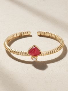 Marina B describes its fine jewelry as "rich and opulent yet so very contemporary." Made from 18-karat gold, this cuff is centered by light-catching diamonds and a rubellite in the signature 'chestnut' shape. The coiled band has a touch of flexibility, so it's easier to slip on and off. Luxury Yellow Gold Cuff Bracelet With Gemstone, Diamond Cuff Bracelet, Latest Bracelets, Coil Bracelet, Its Fine, Fine Jewelry Bracelets, Diamond Bangle, Fine Jewelry Designers, Diamond Bracelets