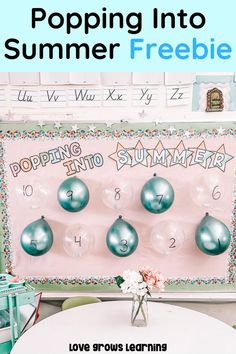 a white table topped with lots of green balls and numbers next to a sign that says poppin'into summer freebie